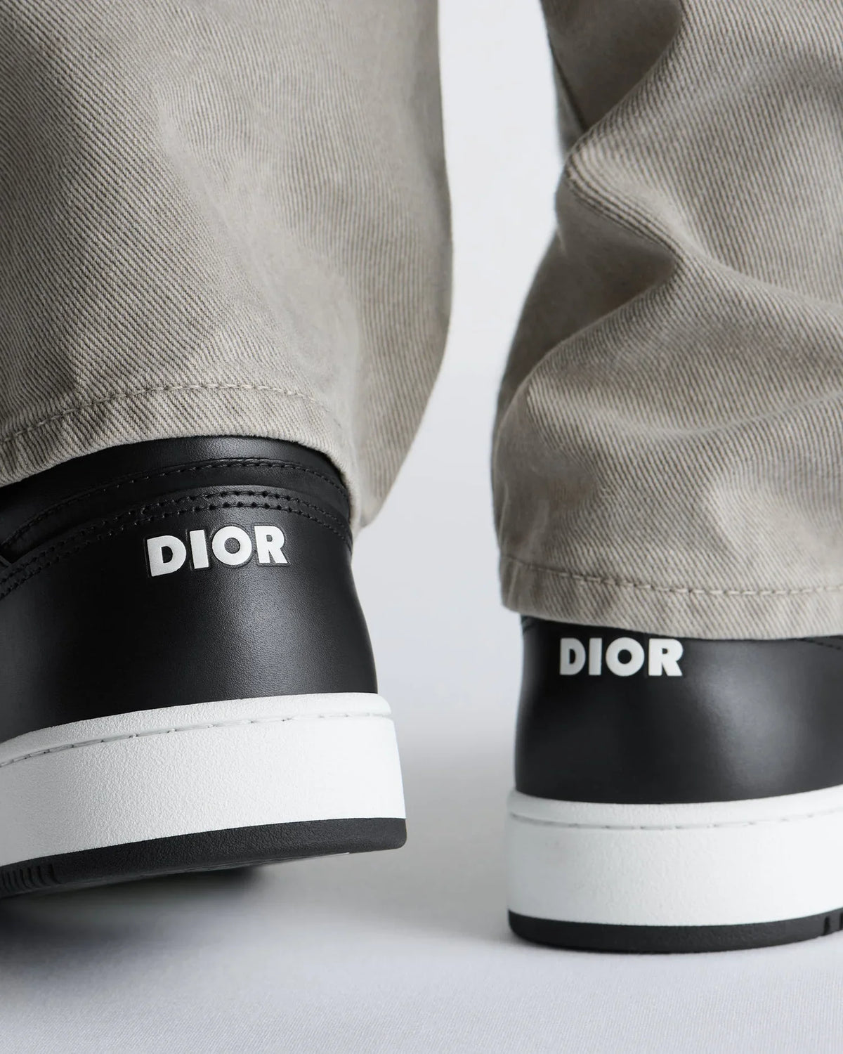 Dior B27 Uptown Men’s Low-Top Sneakers in Black Calfskin & Silver Oblique Jacquard
