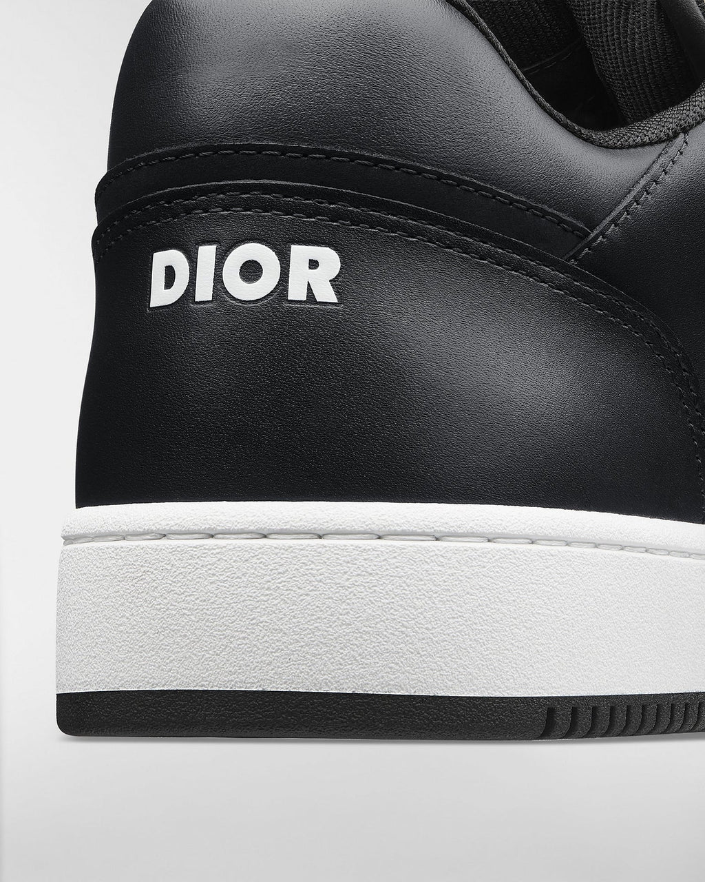 Dior B27 Uptown Men’s Low-Top Sneakers in Black Calfskin & Silver Oblique Jacquard